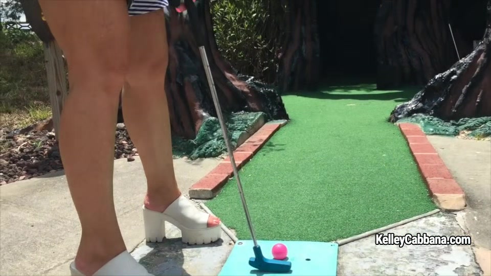 Busty MILF Kelley Cabbana matrubates with red bal on the golf court
