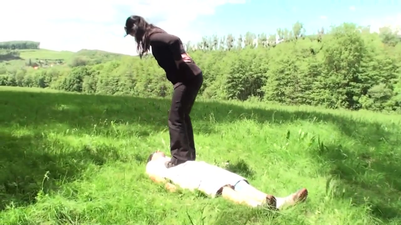 Outdoor trampling punishment with muddy shoes by Femdom Austria