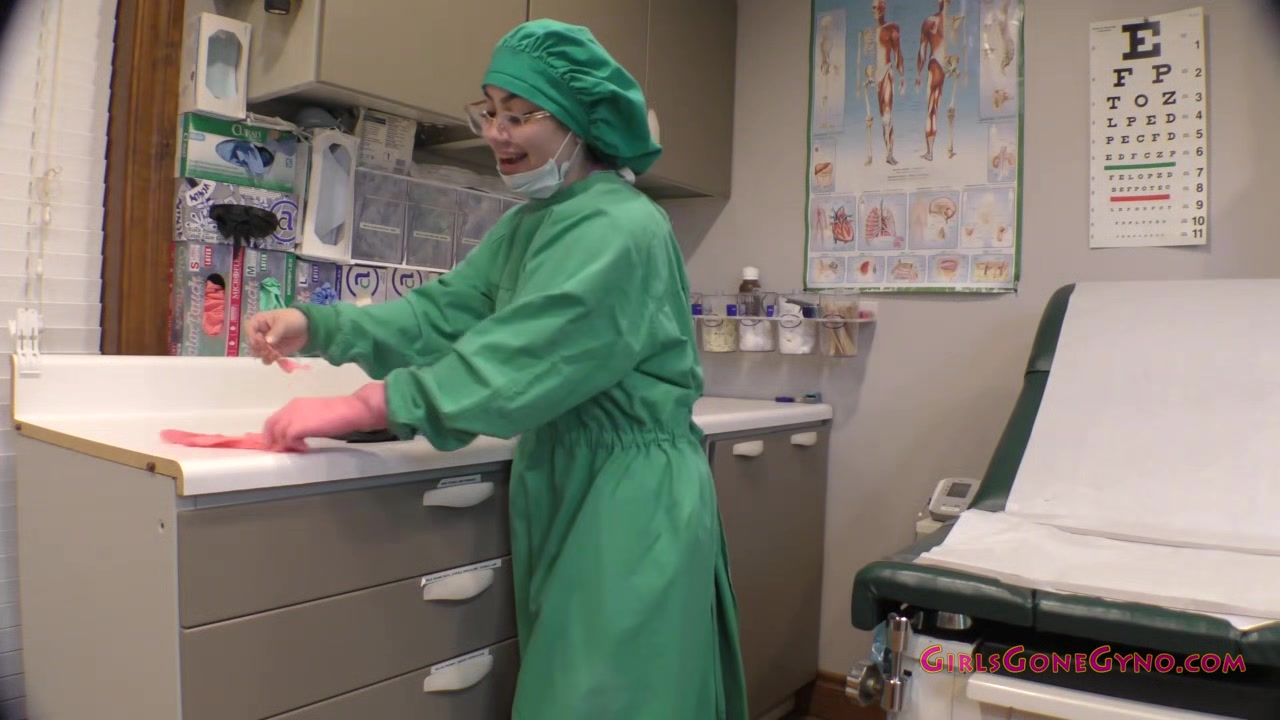 Nurse Lenna Lux Trying On Gloves - Part 1 of 1