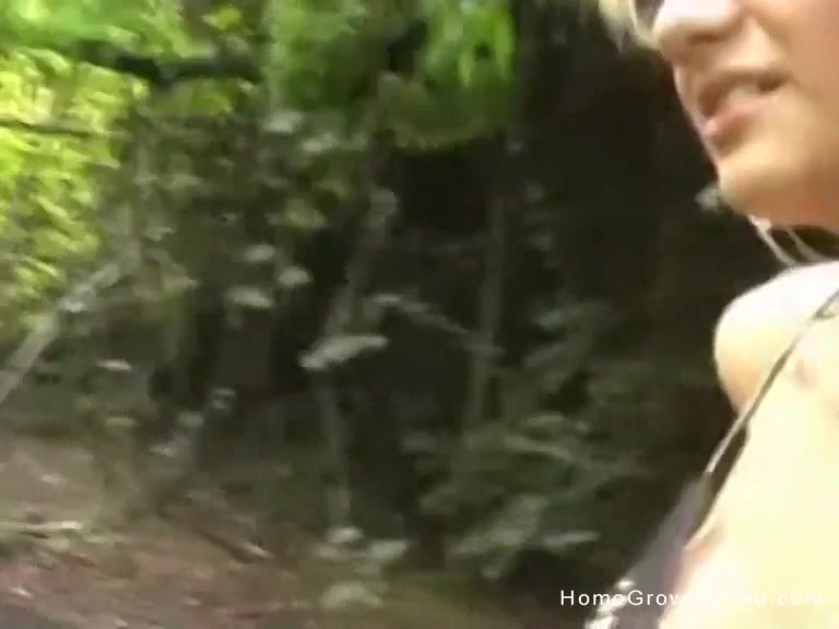 Big tit milf in bikini jerks off her boyfriend in the woods