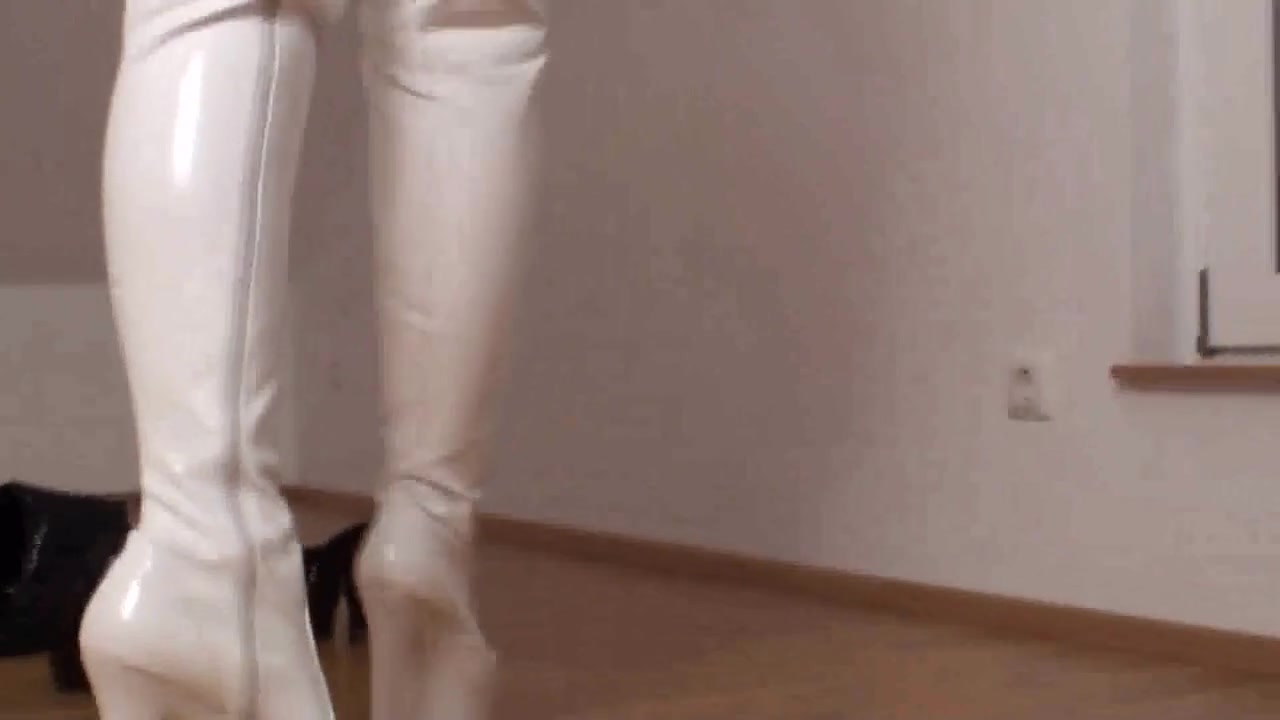 Busty blonde MILF tries out some shoes by Foot Girls