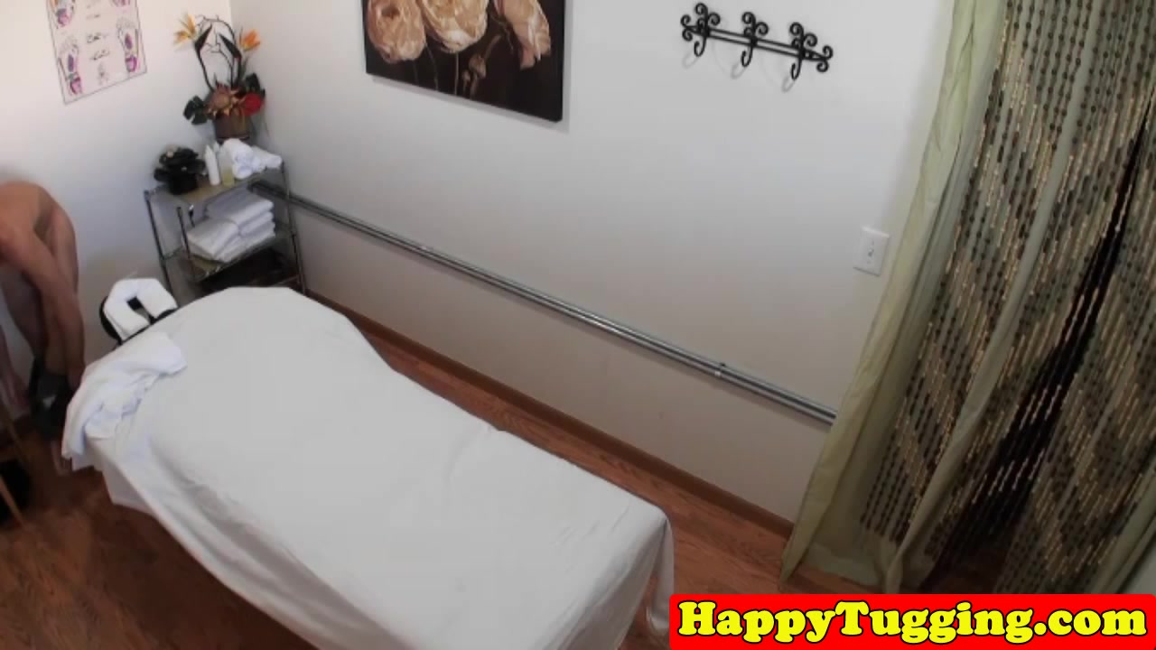 Asian masseuse riding and tugging her client