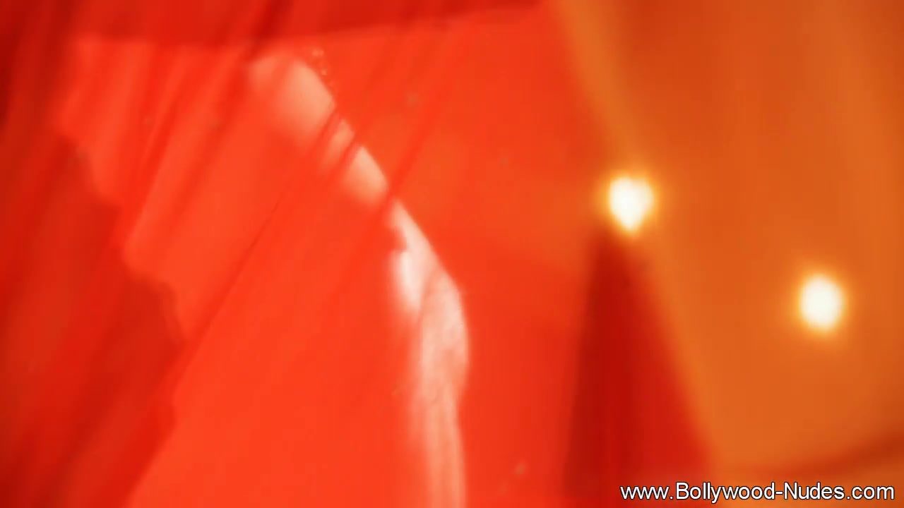 A daring Indian Lady dancing with a seductive way of showing her naked body