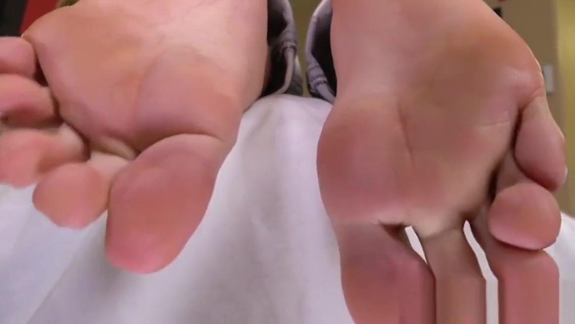 Stunning shemale showing pedicured feet