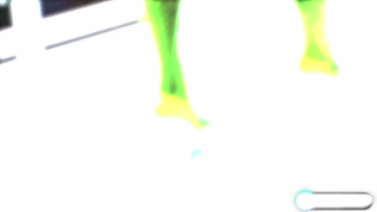 Green fishnets and fuck-me pumps