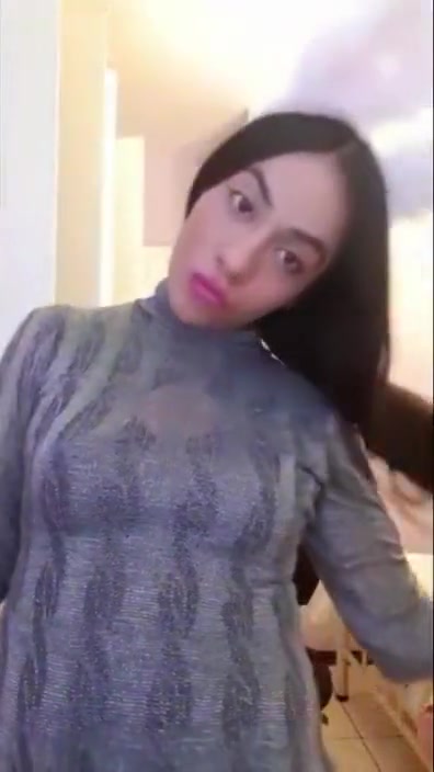 Cute teenage girl trying to show off her body in tight dress - teen 18+ strip