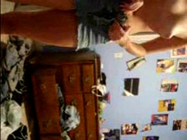 Blonde young girl taking her clothes off slowly