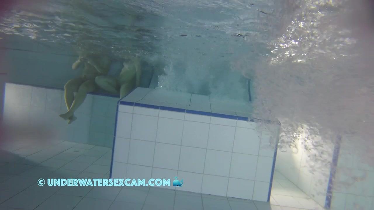 Sporty Couple Regenerating On An Underwater Bench