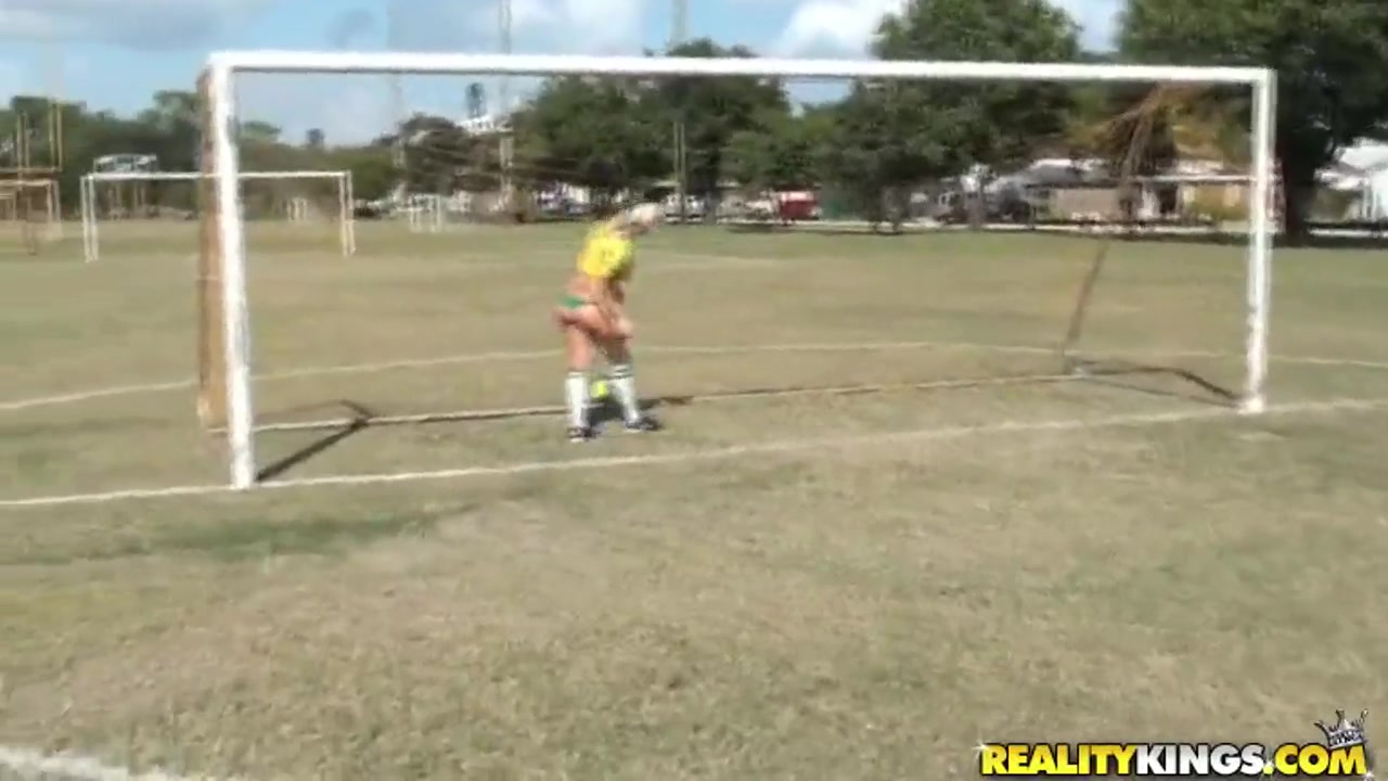 Molly Cavalli and Tiffany Tyler play football