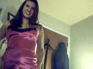 Pretty babe in pink stripping and masturbating