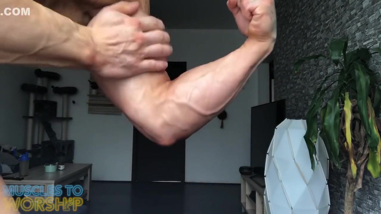 College Wrestler Flexes Muscles