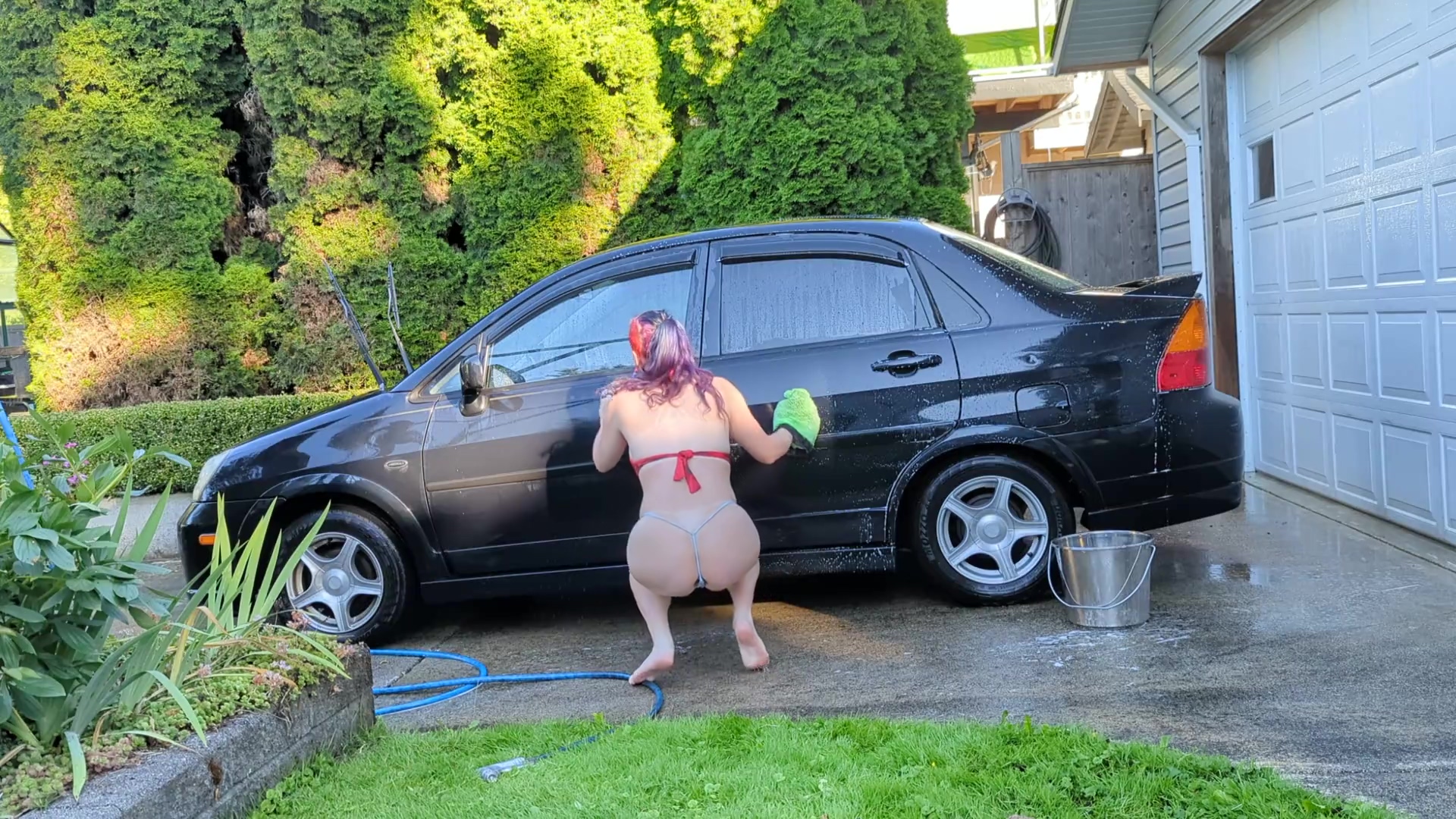 Sexy T4t Trans Woman Washes Her Filthy Car For The Hungering Maw Of Capitalism With A Big Glass Plug