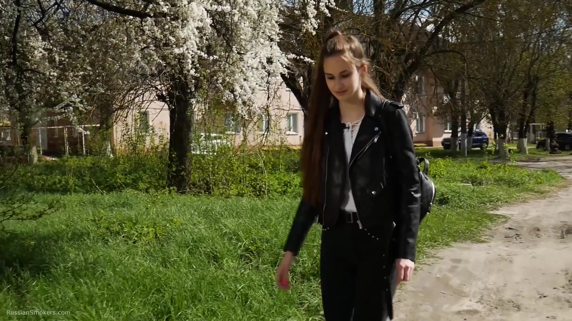 Non Smoker Masha Is Smoking Two All White 120mm Cigarettes Outside