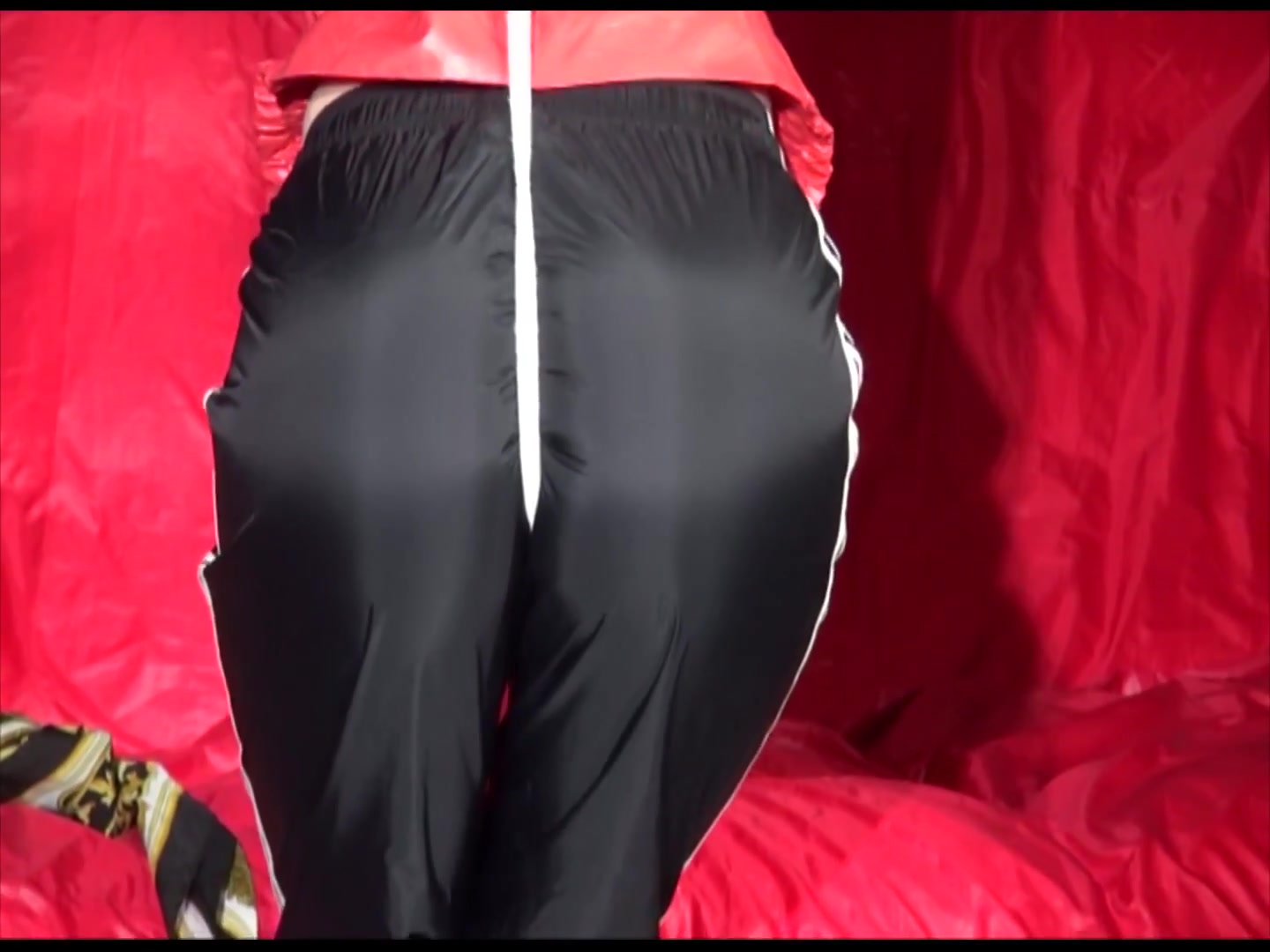 Get 2 Videos With Lucy And Sonja From Our 2011 Archives Enjoying Bondage In Their Shiny Nylon Rainwear
