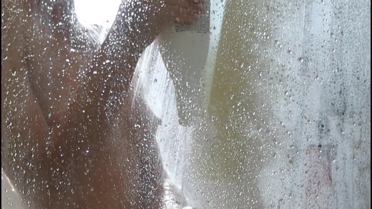 Sexy Redhead Beauty Rubs Herself With Coffee In The Shower