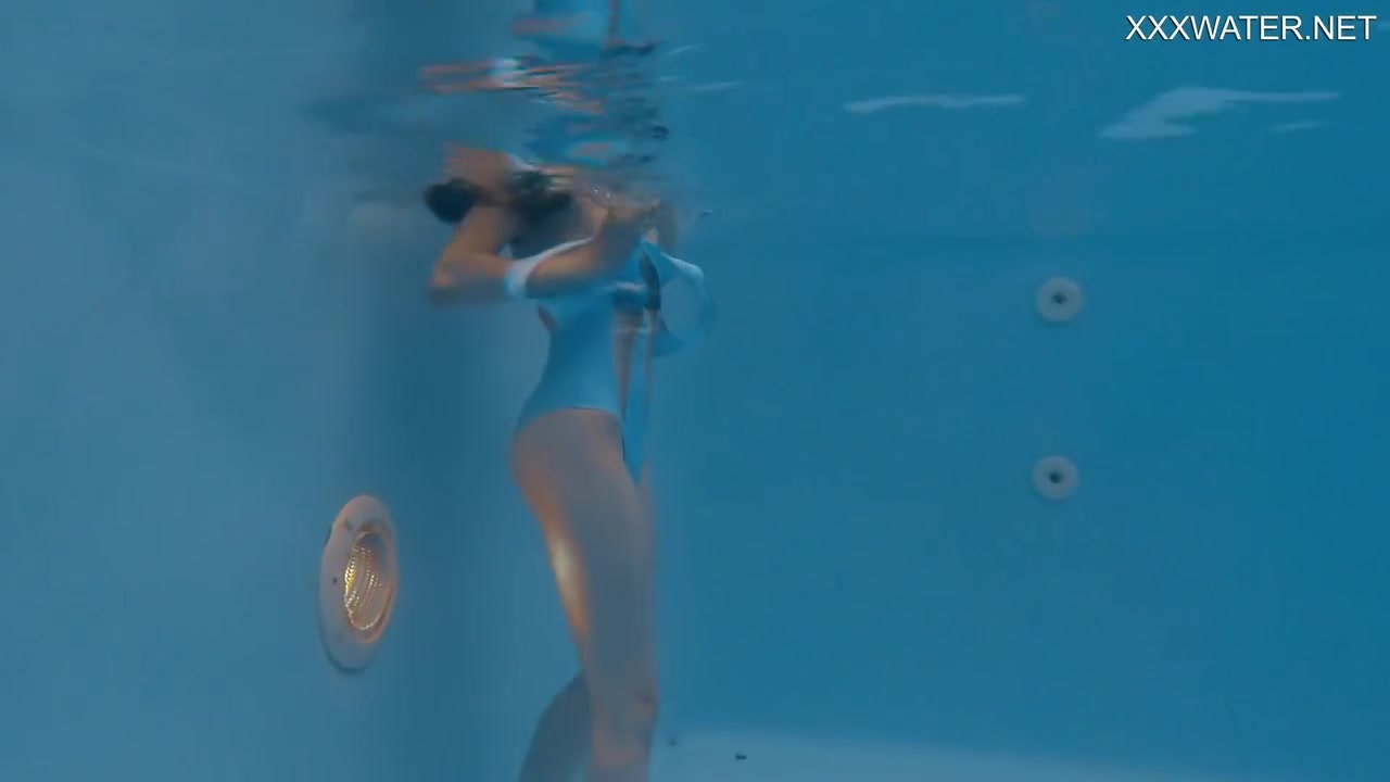 Petite Russian Marfa Swims Nude In The Pool
