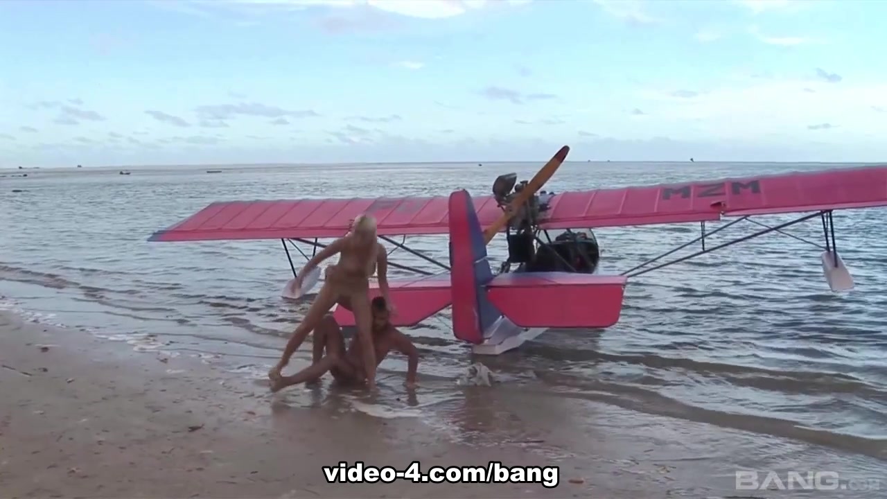 Caylian curtis fucks a pilot on a secluded island beach - BANG
