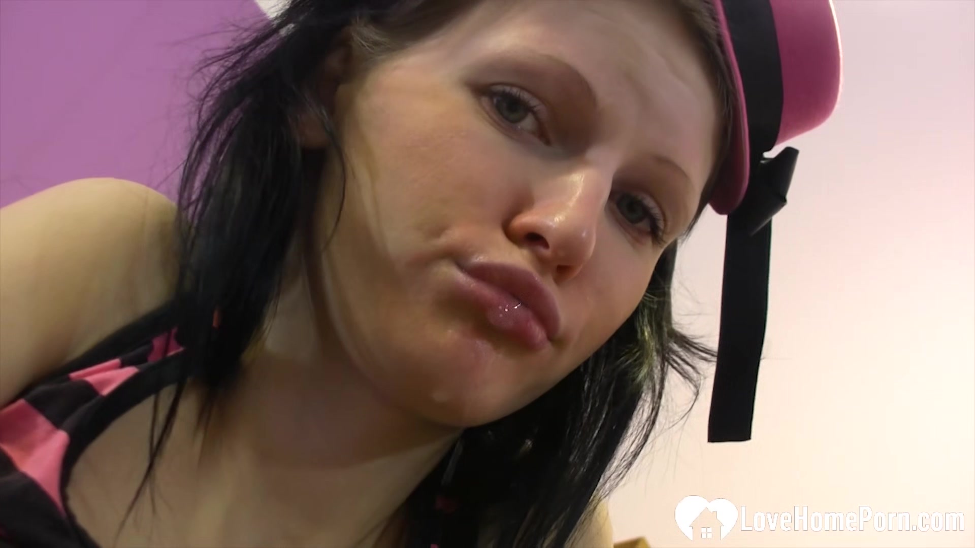Naughty babe with a tiny hat stripping