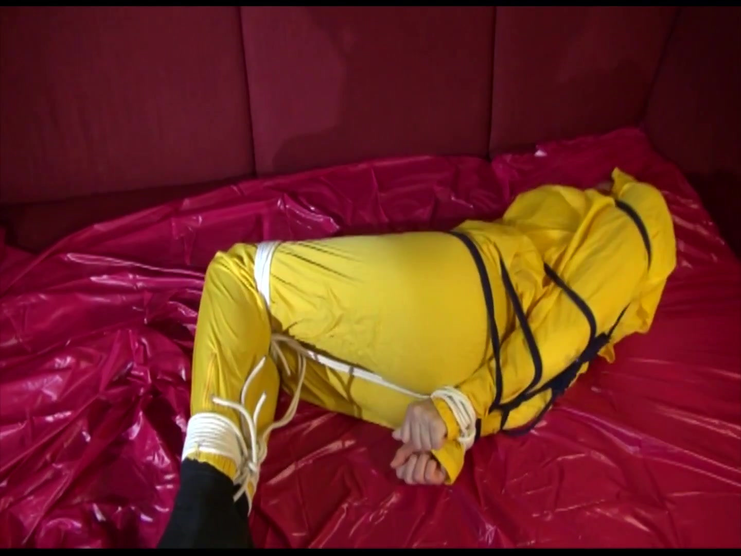 Get 2 Videos With Lucy Bound And Gagged Enjoying Her Shiny Nylon Rainwear From Our 2021 Archive