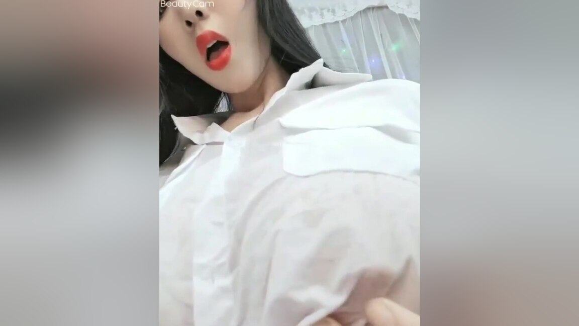 Beautiful Asian Babe Playing On Camera