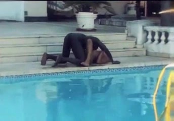 Ebony man bonks blonde TS by pool