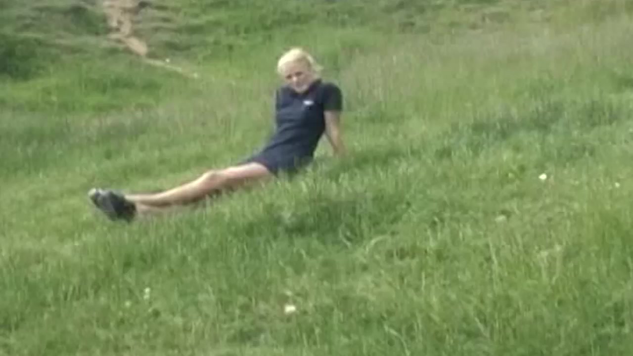British blond outdoors flashes pants