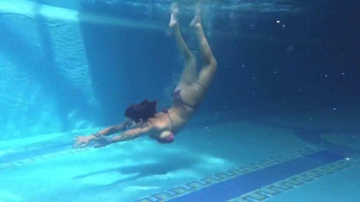 Pornstar Swims Naked In The Pool