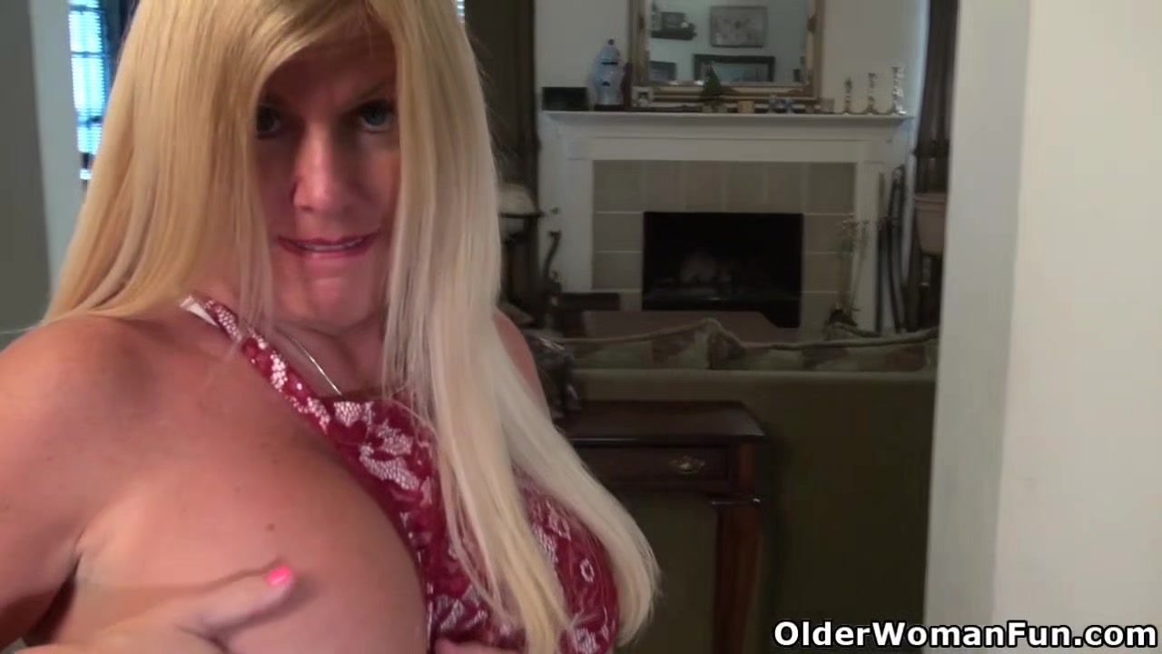 American milf Blake slides out of her new dress for us