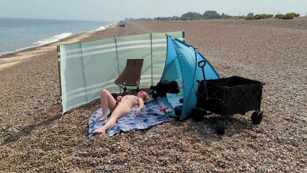 A Young Blonde Wife Is Nude And Masturbating On A British Public Beach