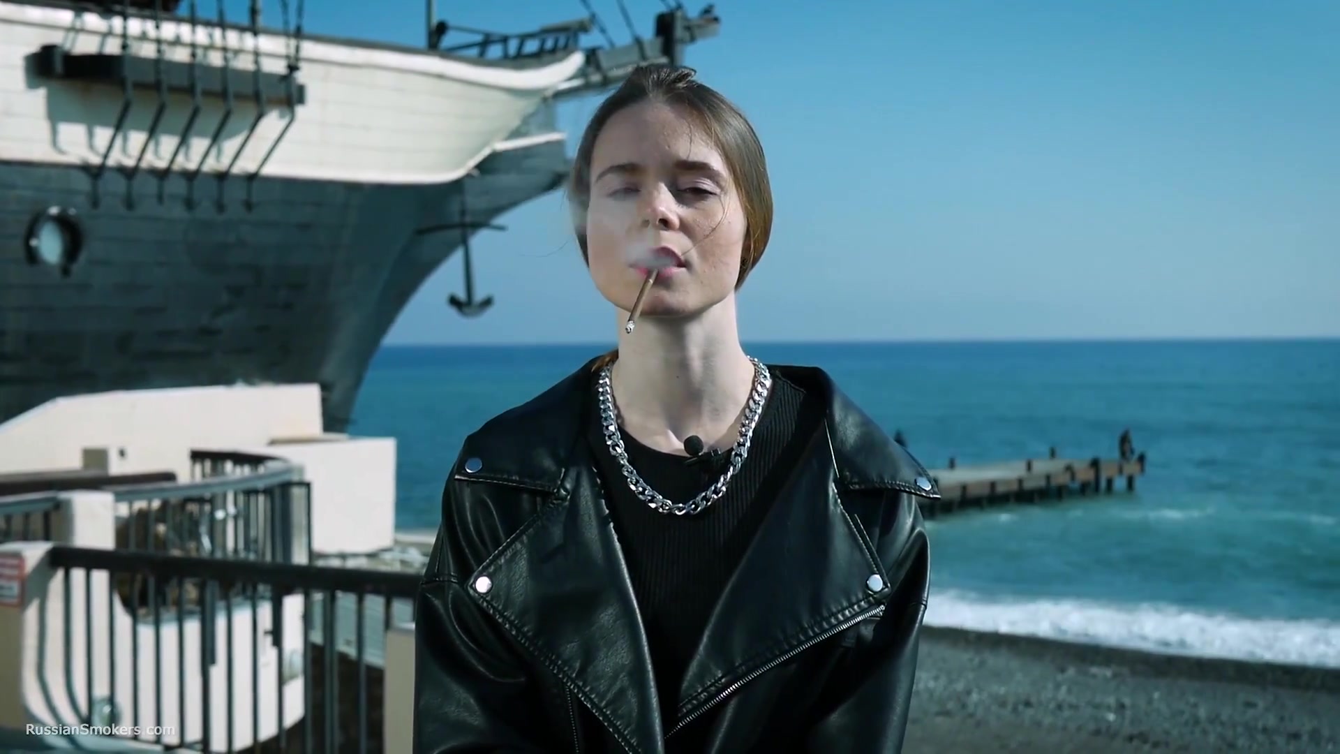 Smoking Strong Brown 120mm Cigarette Near The Beach