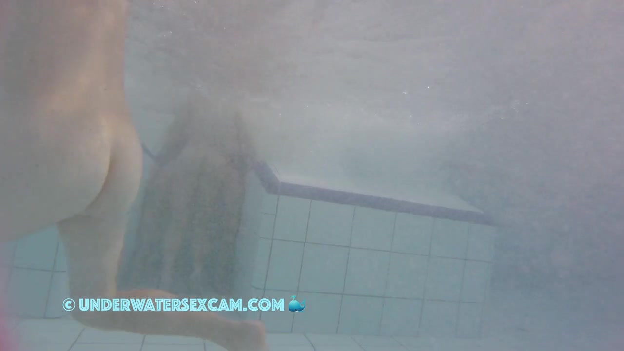 This Young Couple Plays Together Underwater In Front Of Many People