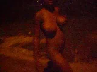 Sexy Ebony want to attract attention of the guys by walking naked