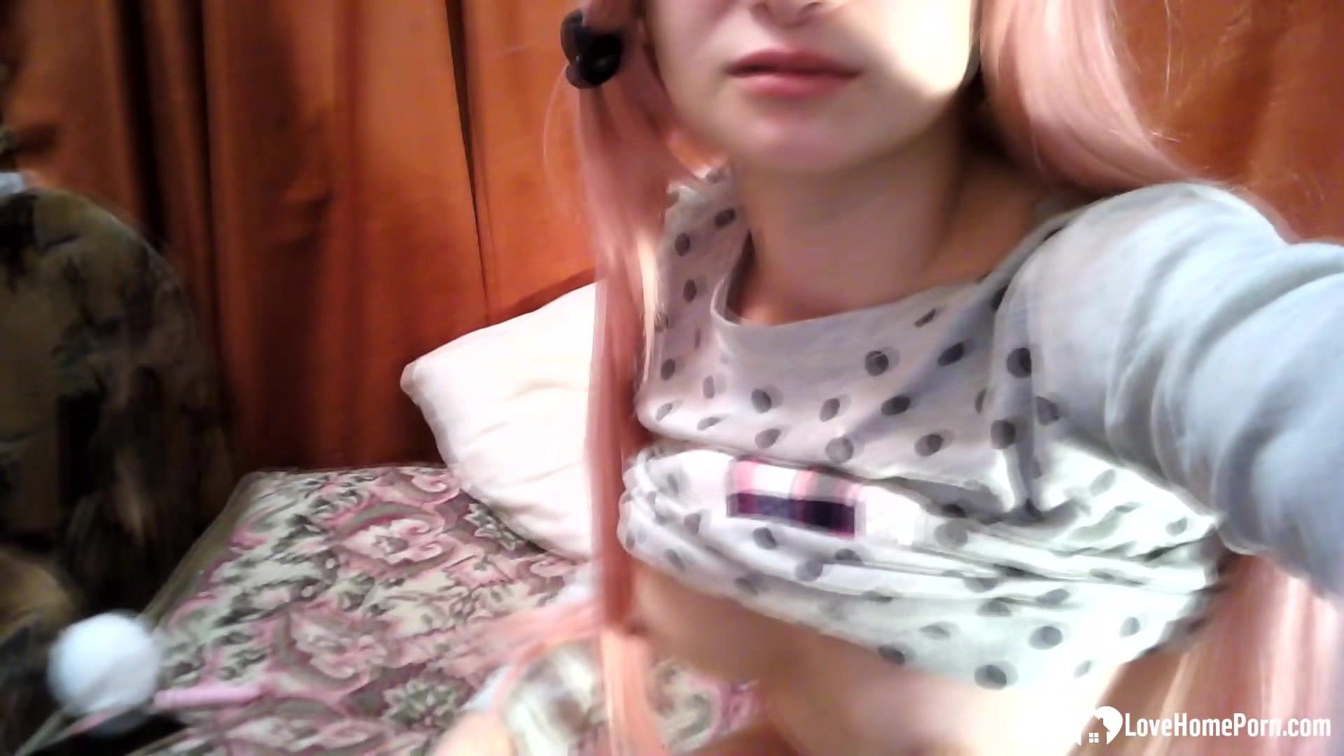 Horny pink-haired babysitter masturbates on the webcam