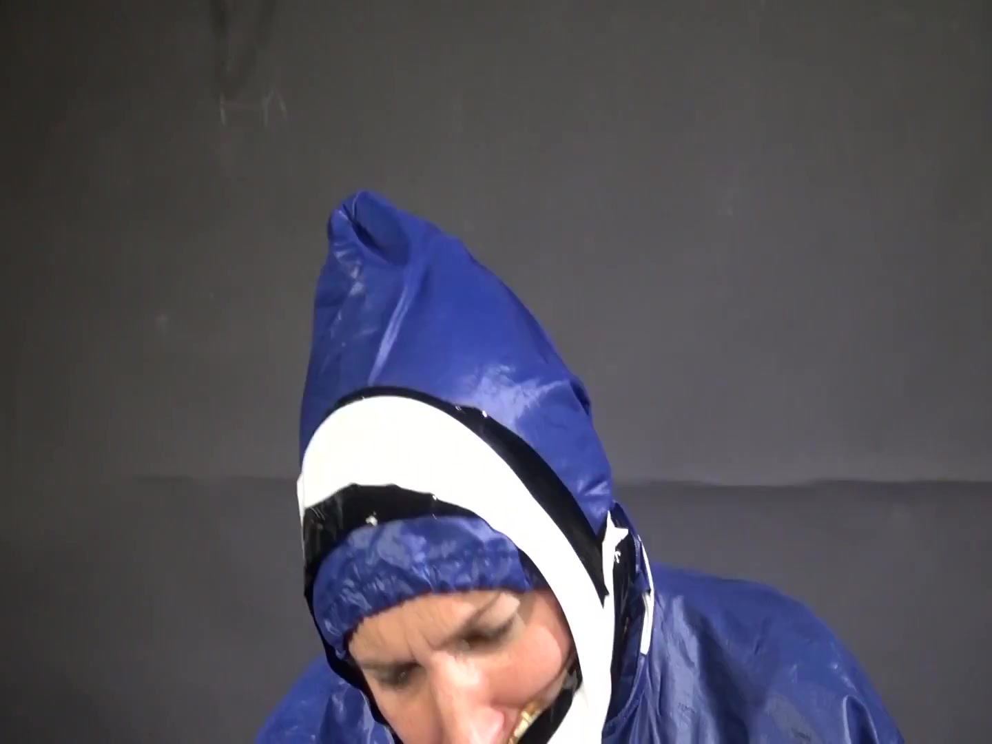 Watch Sandra Beeing Bound, Pantygagged And Finally Pantyhooded In Her Shiny Nylon Rainwear