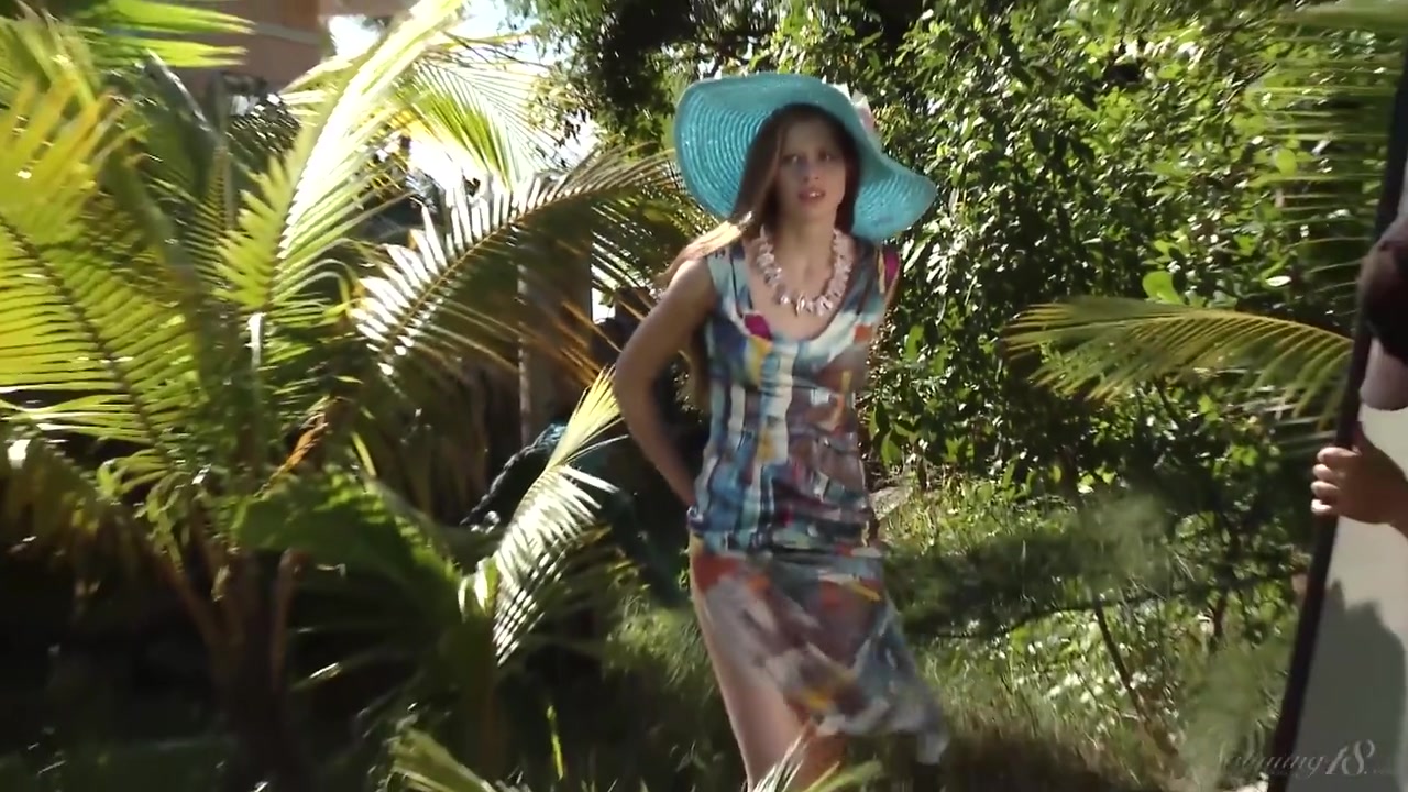 Sexy teen 18+ In A Hat And Dress Poses