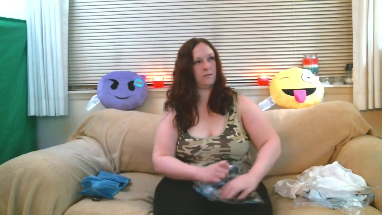 thick redhead tries on some clothes and shows off her ass and tight pussy
