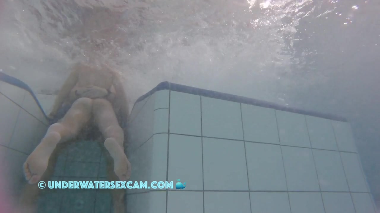 This Young Couple Plays Together Underwater In Front Of Many People