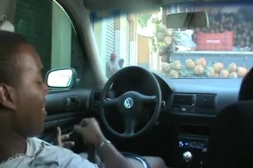 Dark-skinned babe grinding her pussy on a large cock in a car