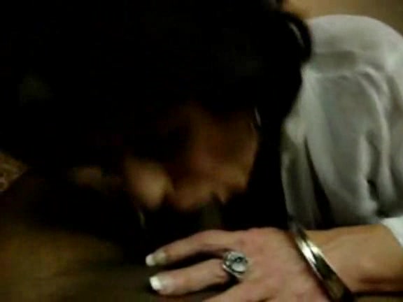 Mature woman barely fills a fat black dick in her mouth