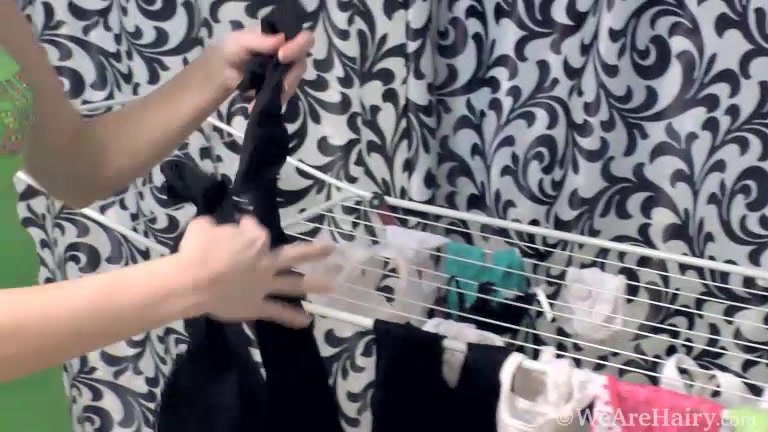 Trixie hangs her clothes and masturbates - WeAreHairy