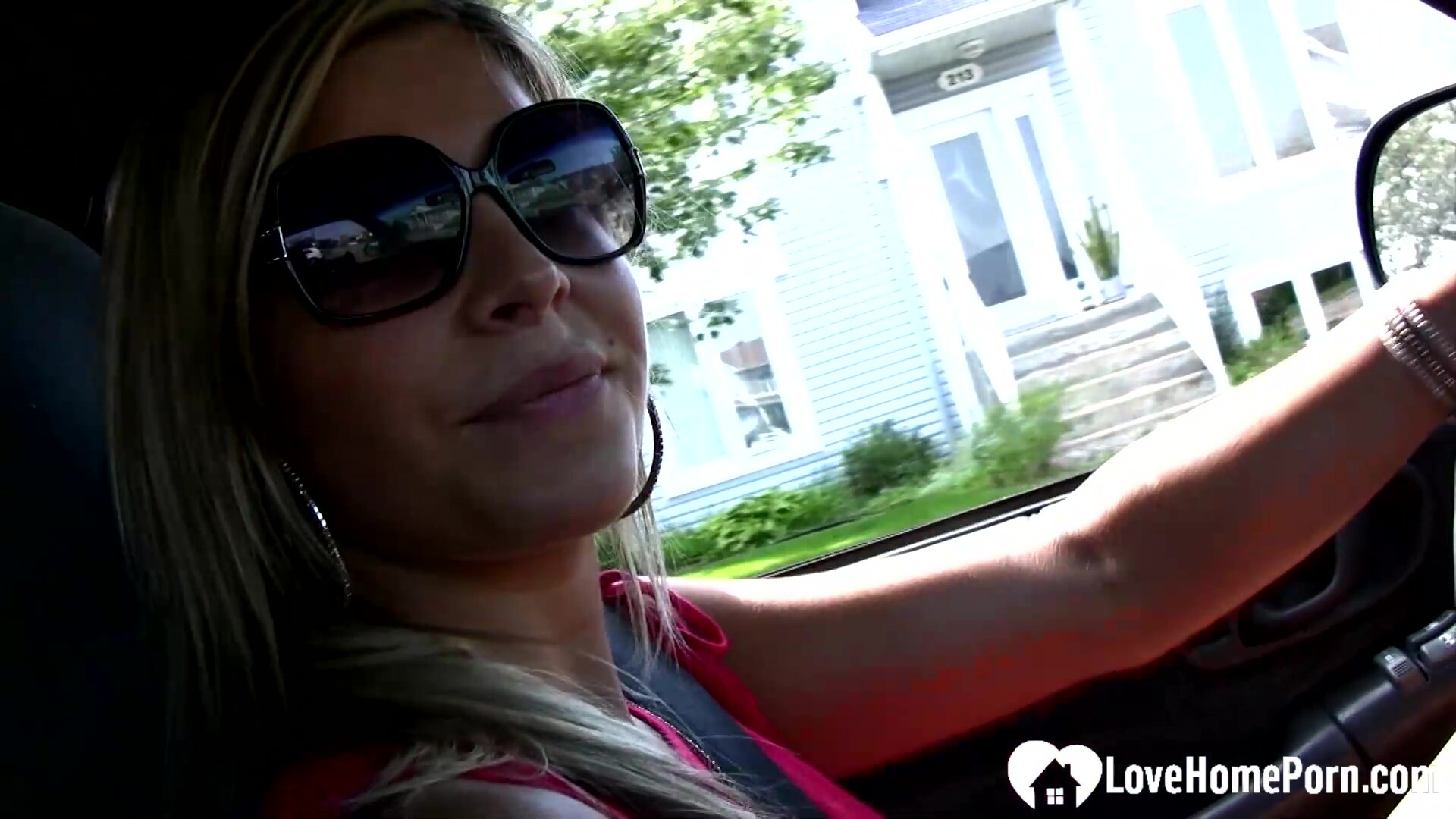 Sexy stepmom shows off feet while driving
