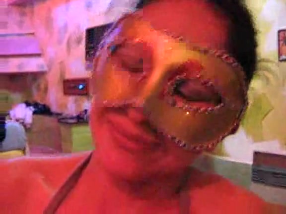 Sympathetic hussy uses mask to dildo her twat on cam