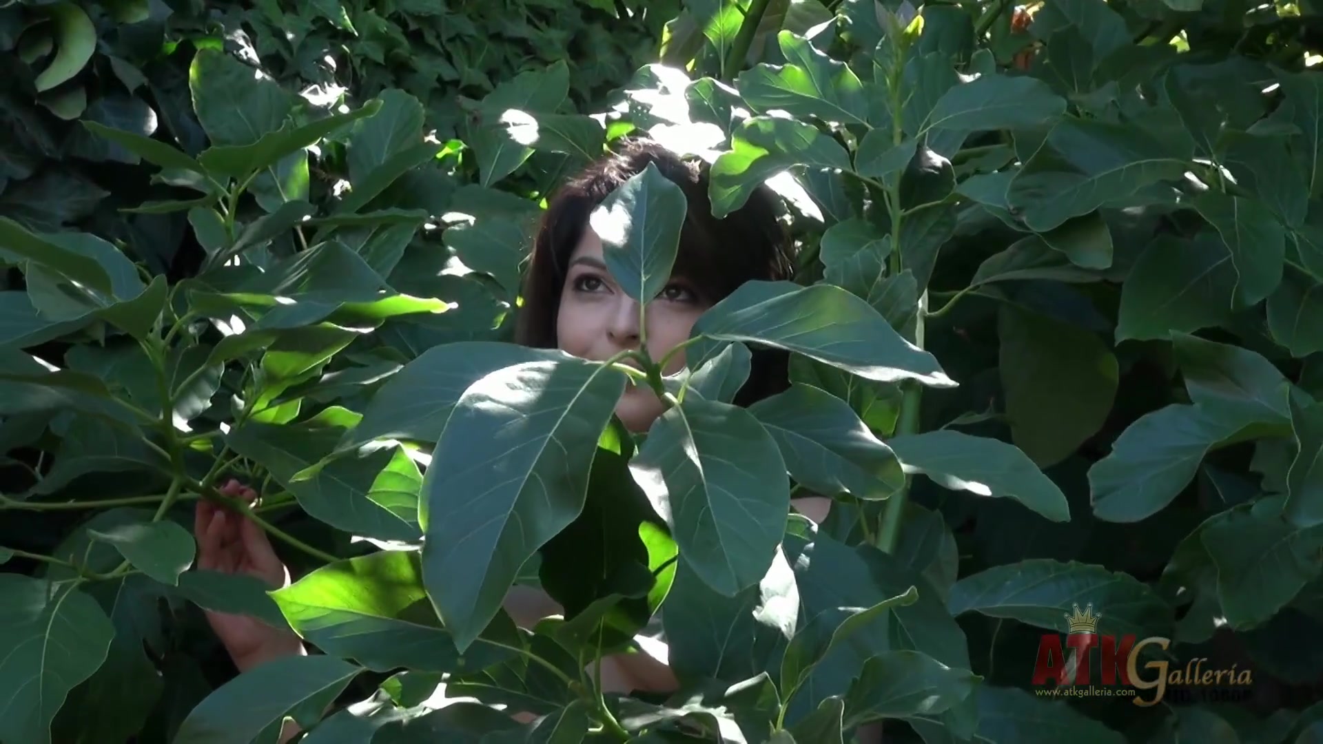 Phoebe is outside getting naked for a photo shoot