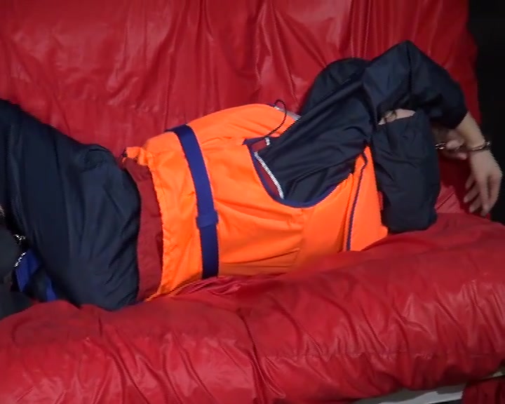 Get 3 Archive Videos With Nice Young Women Enjoying Bondage In Shiny Nylon Rainwear From 2008.