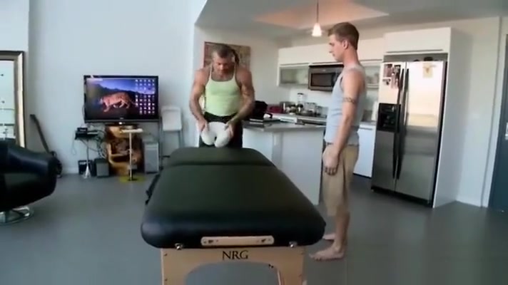 Massage bear slowly touches straight guy