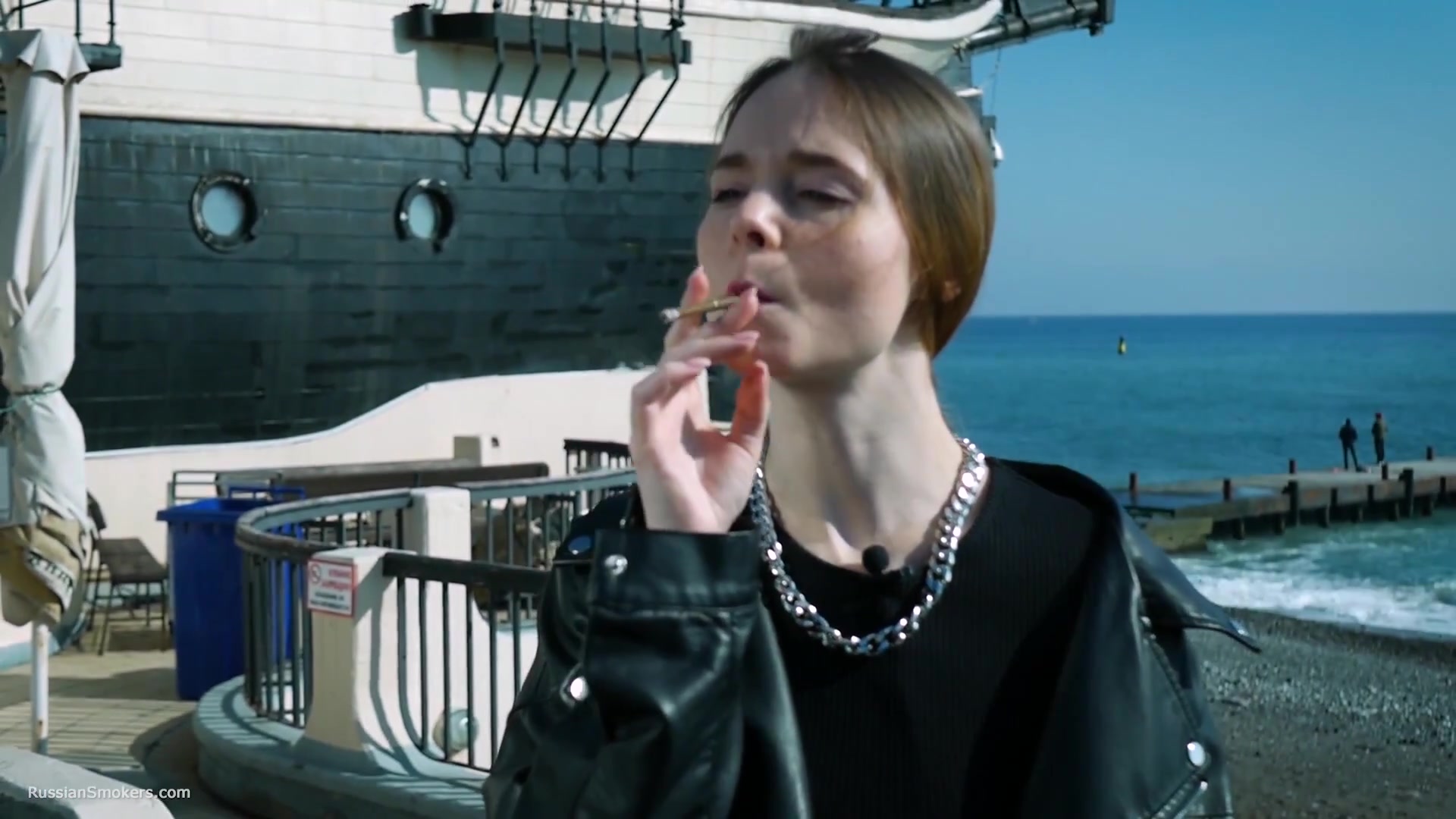 Smoking Strong Brown 120mm Cigarette Near The Beach