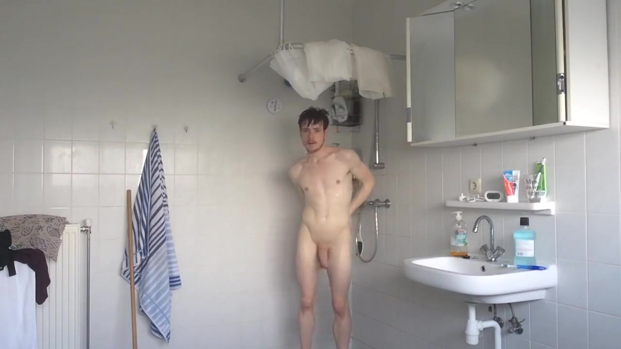 Sexy crossdresser is taking a shower