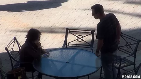 A beautiful girl is stood up by a real loser