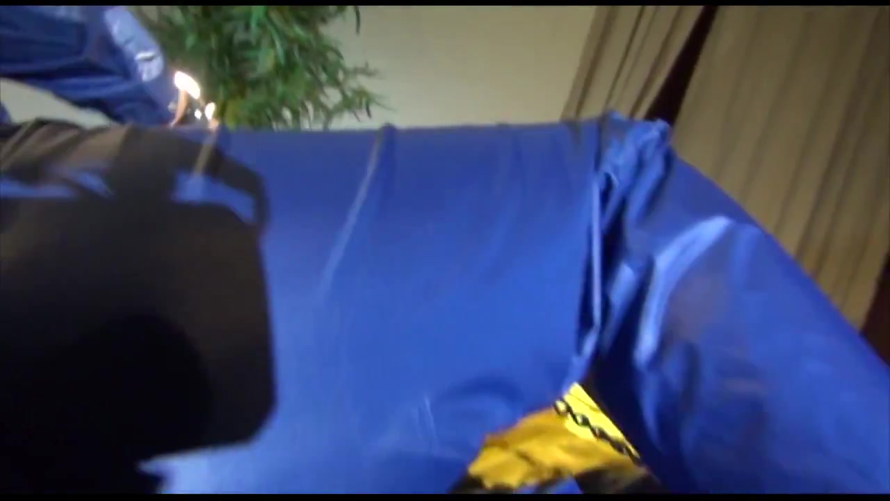 Get 2 Videos With Lucy Bound And Gagged In Her Shiny Nylon Rainwear From Our Archives