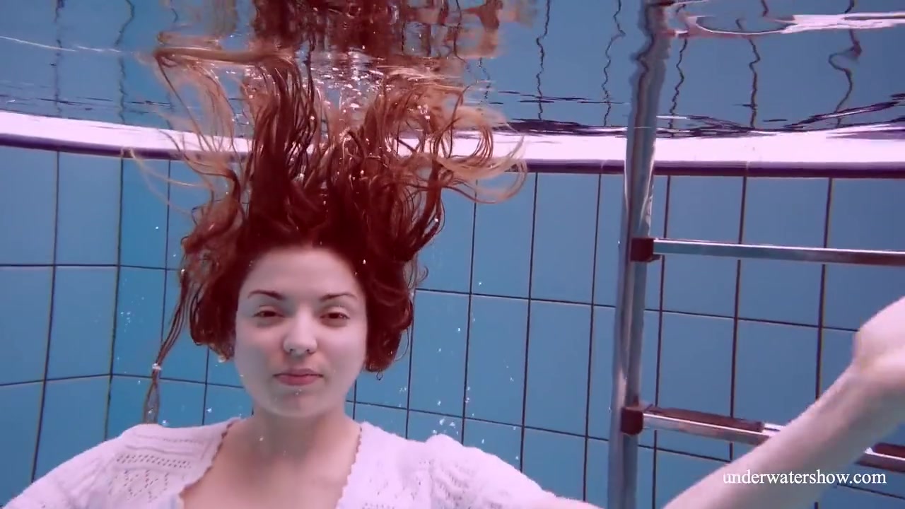 Redhead Marketa In A White Dress In The Pool
